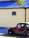 Mini vintage promotional car outside side buildings at entrance of Seppeltsfield estate